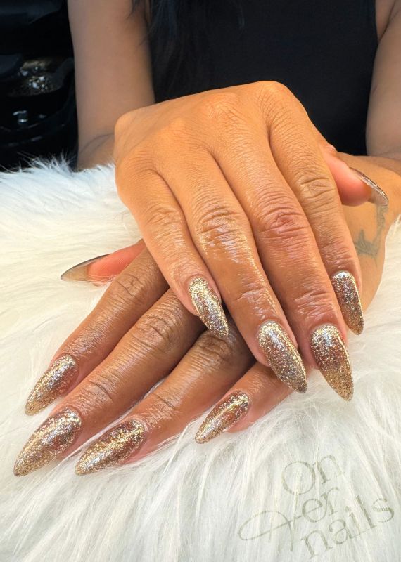 gold-glitter-nails-on-her-nails-weston-rd-north-york-nails-near-me